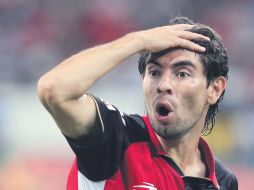 Flavio Santos lamenta fallar una ocasión de gol para Atlas, anoche en el partido ante Tigres en el Estadio Jalisco. E. PACHECO  /