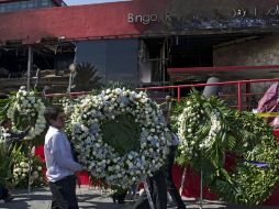 Durante la mañana, los nombres de los afectados del casino fueron recordados en la homilía de la Catedral. AFP  /