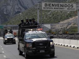 Durante el fin de semana un nutrido contingente de policías federales arribó a Monterrey para reforzar la seguridad. REUTERS  /