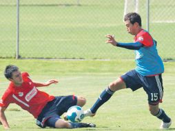 Kristian Álvarez (suelo) y Érick Torres brillaron con el Tri Sub-20 en el Mundial de Colombia. MEXSPORT  /