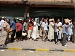 La OIM alertó de miles de personas que desean ser evacuadas de Trípoli ante los disturbios en Libia. AFP  /