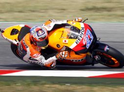 El australiana Casey Stoner gana la 'pole' con un tiempo de 1:33,138. REUTERS  /