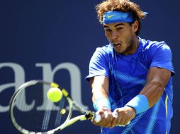 Rafael Nadal contra Gilles Muller en el primer turno de la jornada de hoy. AFP  /