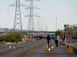 Los cuerpos ya fueron identificados, y se investiga el móvil de su asesinato. NTX  /