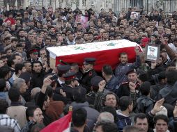 Al menos dos mil 105 civiles y 542 soldados han muerto por la represión de Al Asad. ARCHIVO  /