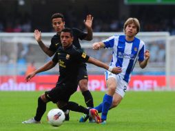 El chileno podría perderse de nueve partidos de la Liga Española y cuatro de la fase de grupos de la Champions. AFP  /