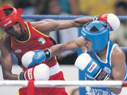 Jefferson Ryan (rojo), durante su combate en el día 10 de los Juegos Panamericanos de Río de Janeiro 2007. MEXSPORT  /