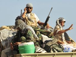 Según la OTAN, las fuerzas rebeldes podrían avanzar hacia las ciudades controladas por los leales a Gadhafi. REUTERS  /