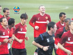 Wayne Rooney (9), quien lleva ocho goles en cuatro partidos de la Premier, encabezará el ataque del United en el Estadio de la Luz. AP  /