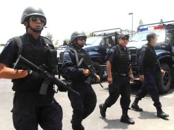 El operativo de seguridad contará con 580 elementos a bordo de 115 patrullas, los cuales estarán por las vías más importantes. ARCHIVO  /