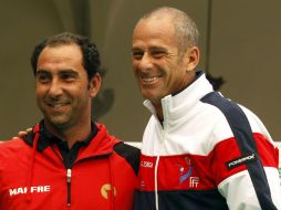 Forget (d) comenta que no se arrepintió de haber elegido a Gasquet en lugar de Jo-Wilfried Tsonga.  EFE  /