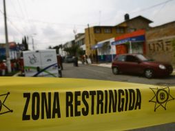 El cruce de las calles donde aconteció el homicidio fue declarado como zona restringida. O. RUVALCABA  /