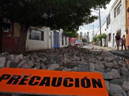 En el Centro de Tlaquepaque, el adoquín de las calles Prisciliano Sánchez y Contreras Medellín ya ha sido levantado. A. MADERA.  /