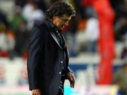 Rubén Omar Romano suma otra derrota al frente del Atlas. MEXSPORT  /