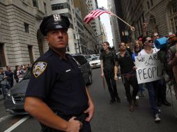 Ante los operativos de la Policía, los manifestantes recurren a Trinity Place, lugar elegido para celebrar ''asambleas''. REUTERS  /