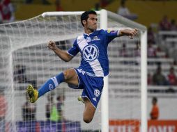 El español Luis García celebra su anotación, la cual llegó por la vía penal. EFE  /