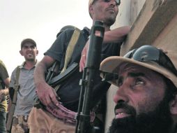 Los rebeldes lograron entrar a la primera línea en Sirte, uno de los últimos bastiones del ex jefe del Estado libio, Muamar Gadhafi.AFP  /