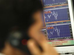 El euro cotizaba con leves cambios en 1,3702 dólares en la plataforma EBS. AP  /