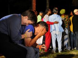 Manifestantes y familiares del condenado expresaron su tristeza frente a la decisión de la corte. AP  /
