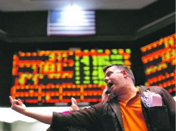 Los mercados de valores estadounidenses reaccionaron a la baja al anuncio de la Reserva Federal. ARCHIVO  /