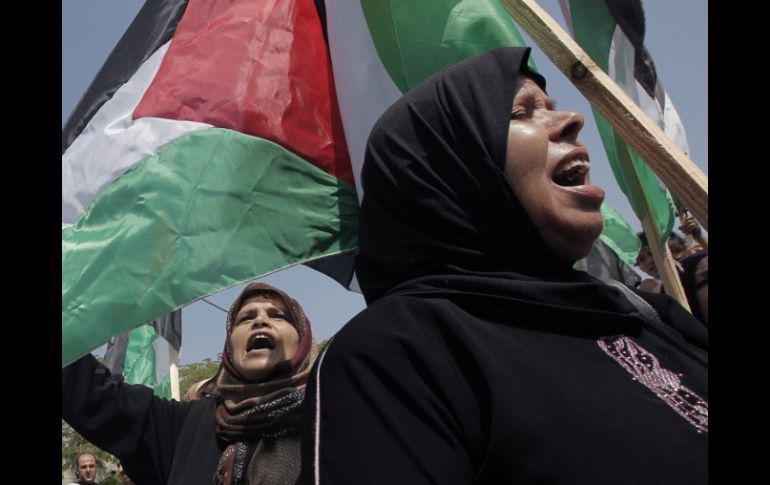 Mujeres parte de una manifestación en Gaza para apoyar al líder Mahmud Abbas en su petición. AFP  /