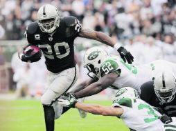 Darren McFadden logró que los Raiders ganaran su primer partido en casa. ARCHIVO  /