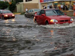Esta tarde la lluvia sorprendió a la ciudad y ocasionó cierres e inundaciones en diferentes vialidades. M. FREYRÍA  /