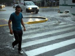La tarde del martes, la lluvia sorprendió a los tapatíos. A MADERA  /