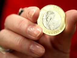 El precio a al compra llegó a $12.10 pesos por dólar. ARCHIVO  /