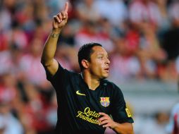 Adriano Correia festeja la única anotación del Barcelona en este encuentro con el Sporting de Guijón. AP  /