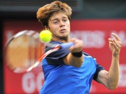 El tenista estadounidense Mardy Fish resistió un duro encuentro ante su compatriota Ryan Harrison. AFP  /