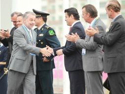 Emilio González encabezó la ceremonia del izamiento de la Bandera nacional en la Villa Panamericana.  /