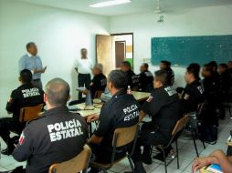 Los familiares y policías cesados por no pasar los exámenes de confianza exigen indemnización y liquidación justa. ESPECIAL  /