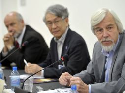 Los científicos Rolf Heuer,Atsuto Suzuki y Pier Oddone dirigen la investigación sobre el bosón de Higgs. AP  /