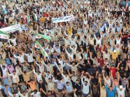 Las multitudes en la calle por la muerte del líder opositor se suman a las protestas contra el presidente Bashar al-Assad. REUTERS  /