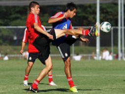Jorge Enríquez (izq.) regresó a una convocatoria de la Selección, luego de perderse la anterior por el golpe que sufrió. MEXSPORT  /