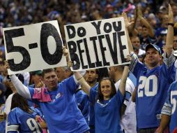 Los seguidores de los Leones de Detroit, felices con la racha de su equipo.  /