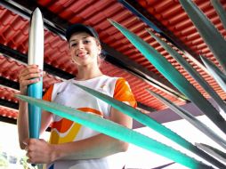 En la imagen, la gimnasta Cynthia Valdez luce la Antorcha Panamericana el pasado mes de julio. ARCHIVO  /