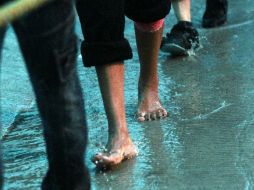 La lluvia y el frío no fueron impedimento para que un millón de personas participaran en la Romería.  /
