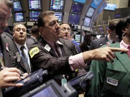 El buen desempeño tecnológico se disparó en Wall Street, mientras que el sector bancario tuvo una recaída del 0.35%. AP  /
