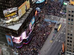 El grupo de miles de personas participó horas más  tarde en una manifestación en Times Square. AP  /