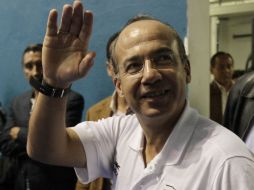 El presidente mexicano, Felipe Calderón, al llegar al Gimnasio CODE II durante los Juegos Panamericanos de Guadalajara. REUTERS  /