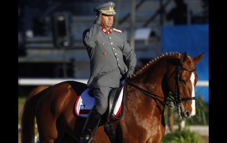 El jinete de Chile, Max Piraino monta a 'Jaguar' durante la competencia. AP  /