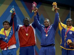 Los cubanos confirmaron hoy su poderío en lucha. AP  /