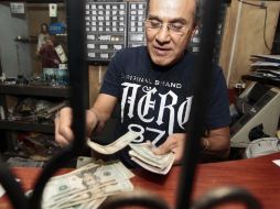 En Guadalajara, el dólar alcanzó un precio de venta de 13.83 pesos.  /