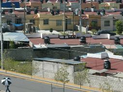 Las viviendas se venden tal como se recuperaron, muchas de ellas pintadas de grafiti, sin puertas o con muebles destrozados. ARCHIVO.  /