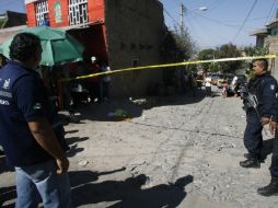 La policia de Tlaquepaque a su llegada logró detener al homicida.  /