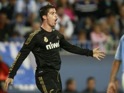 Cristiano Ronaldo celebra un de sus anotaciones, durante el partido del dia de ayer. EFE  /