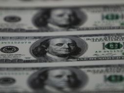 El dólar cerró la sesión cambiaria con una pérdida 12 centavos. ARCHIVO.  /