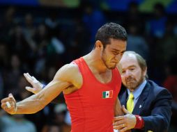 El mexicano le brinda una plata al país en lucha. AP  /